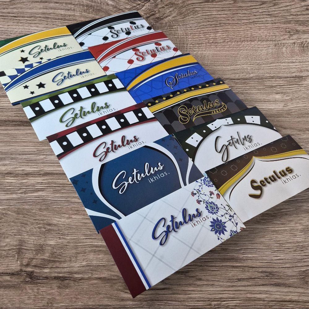 Bundle of 12 Packs (Total 60 pcs) - The Se7en Circles Sampul Raya feat 12 Designs in 157gsm Artpaper with Matte Lamination (5pcs per pack)