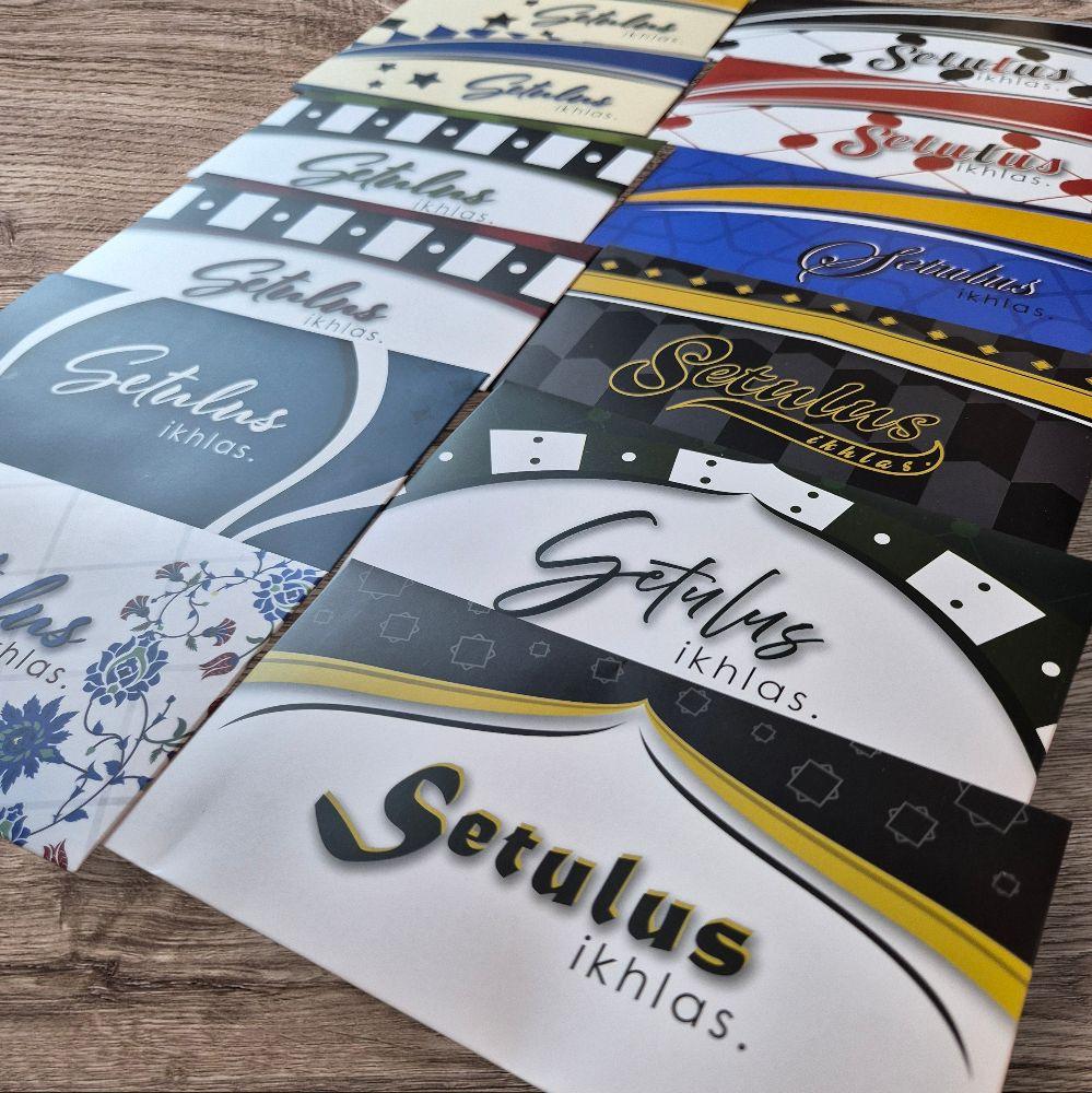 Bundle of 12 Packs (Total 60 pcs) - The Se7en Circles Sampul Raya feat 12 Designs in 157gsm Artpaper with Matte Lamination (5pcs per pack)